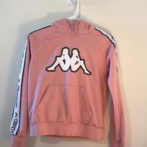 This is an extra small, pink Kappa hoodie.
